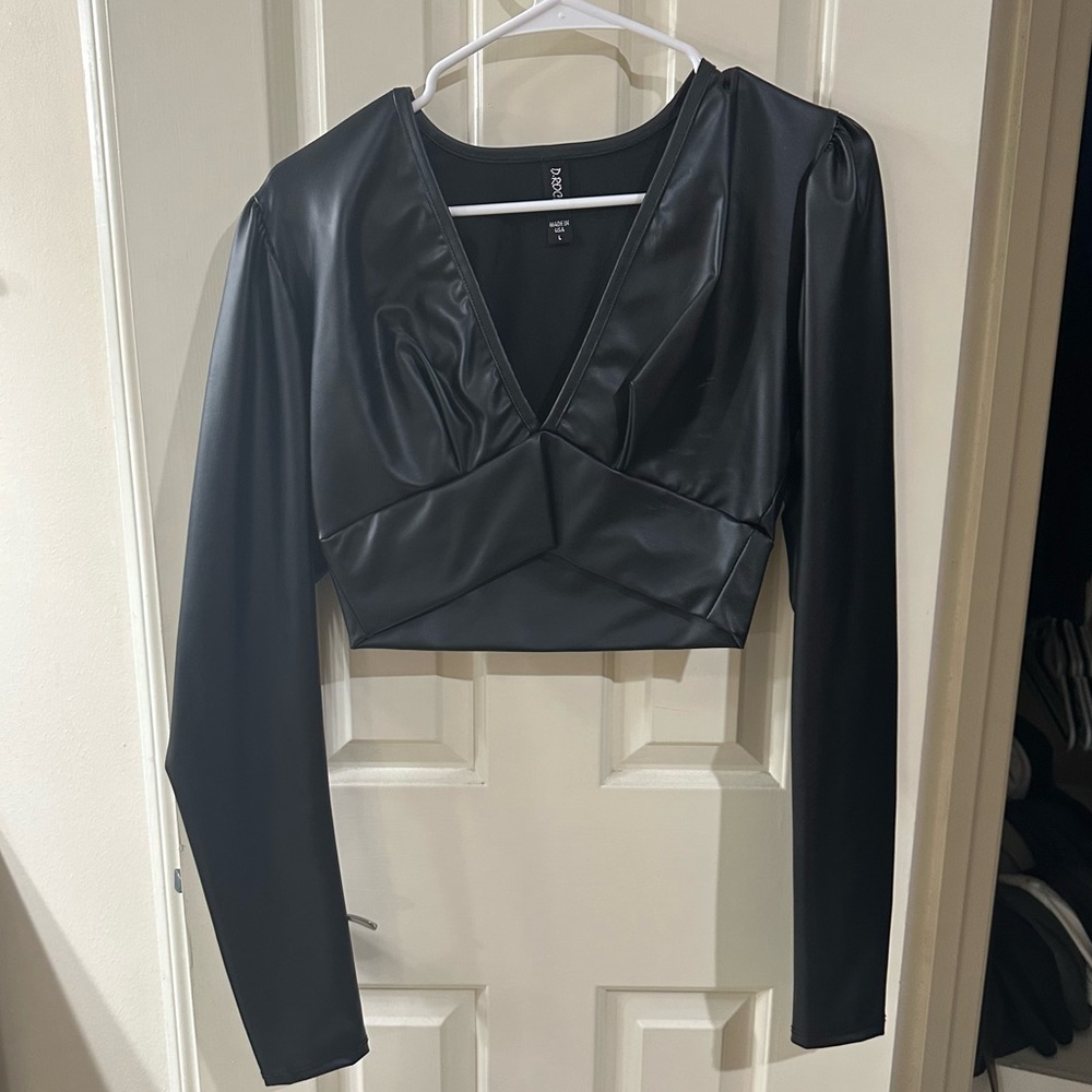 Black pleather long sleeve cropped top.